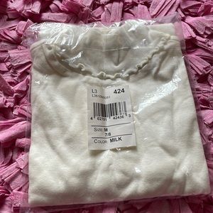 Brand new turtle neck long sleeve shirt size M(7-8)